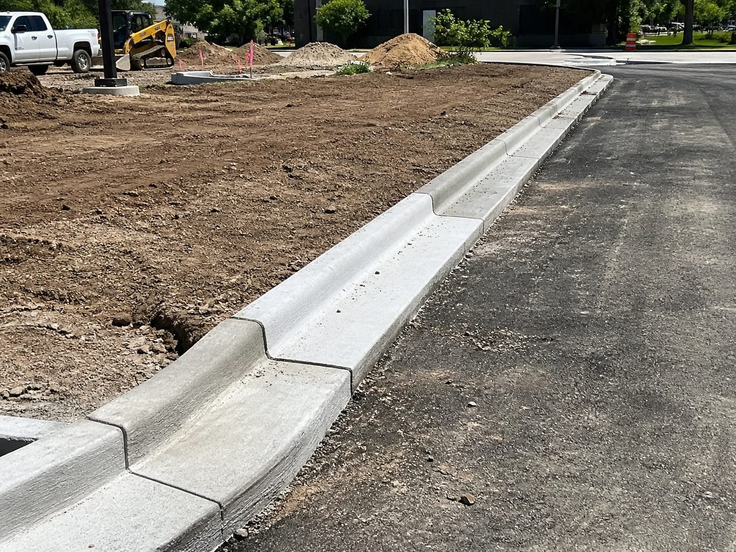 Finished concrete driveway in Gladstone, MO — clean broom finish residential project